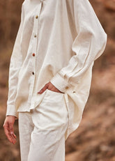 A Model Wearing White Cotton Mul Heer co ord set curated by Only Ethikal
